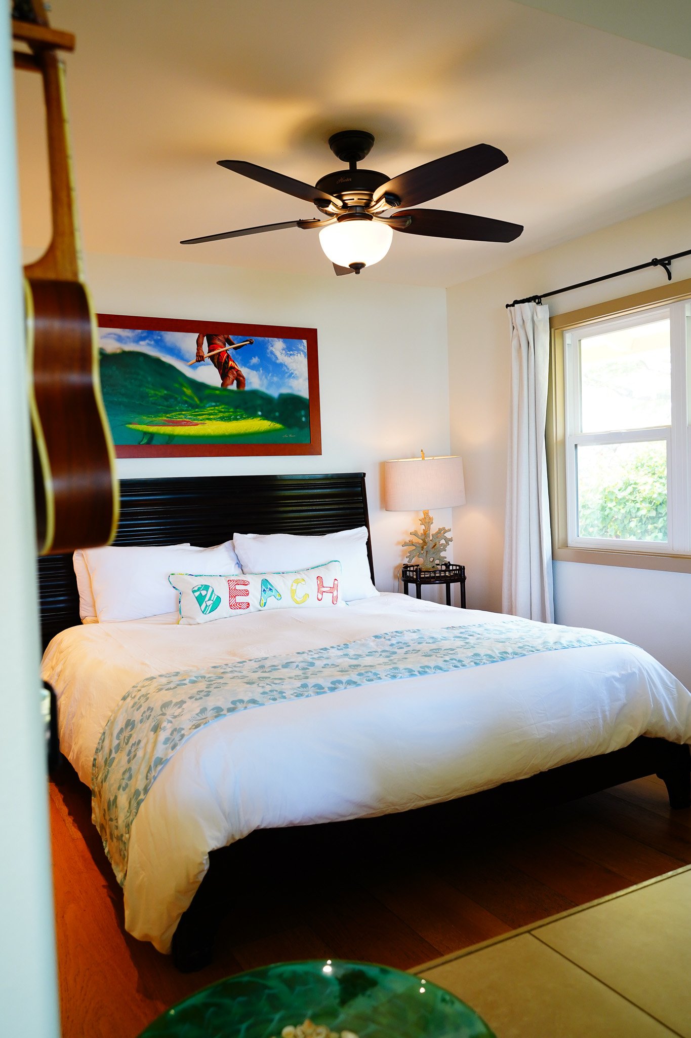 King bed with ocean view inside Hale Wa'a